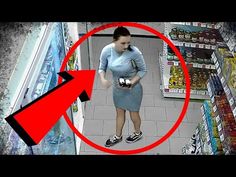 a woman is walking down the aisle in a grocery store with an arrow pointing up