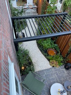 an overhead view of a patio with tables and chairs