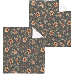 two pieces of fabric with flowers and leaves on the side, one is grey and the other is red