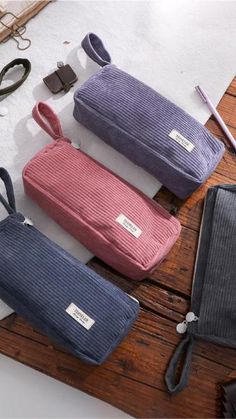 The Minimalist Corduroy Pencil Case is soft and comfortable touch🖐️ with its sleek corduroy ridged pattern and minimalist design🌿. Perfect for organizing pens, pencils, and other small supplies ✃📌📎📏, this pencil case will help you stay organized.

Features
 • Retractable pencil nib to provide full protection on the tip
 • Can store 30-40 pens.
 • Large enough to store a 20cm ruler.
 • It is easy to collapse when it is full.
 • Smooth sliding zipper. Cute Pencil Pouches, Small Makeup Pouch, Tools Art, Cute Pencil Case, Sixth Form, Small Tools, Holiday Wrapping, Korean Stationery, Organization Gifts