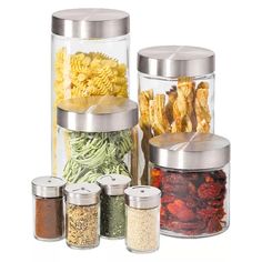 an assortment of spices and condiments in glass containers