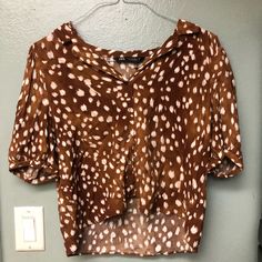 This Is A Zara Blouse That Is Cute And Has A Unique Pattern. This Blouse Is Perfect For The Night Out Of Just A Casual Dinner! Size- Size Xl Condition- Nwot Brown V-neck Shirt For Summer, Fall Season Printed Short Sleeve Blouse, Fall Printed Short Sleeve Blouse, Collared Printed Tops For Day Out, Chic Printed V-neck Shirt, White Short Sleeve Rayon Top, Zara V-neck Printed Tops, Casual Printed Brown Blouse, Brown Collared Spring Blouse