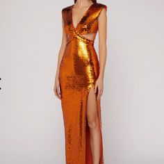 Long Dress With V-Neck At The Front And Back, Characterized By A Particular Interwoven Bodice With Small Holes On The Hips. Special Features Of The Garment Are The All-Over Embroidered Sequins, Which Create An Elegant Play Of Light And Shadow. The Textured Shoulders And Sensual Slit Decorate The Dress. The Style Is That Of The Party Or A Ceremony. Sku:73ajo486n0158511 Materials And Care Made Entirely In Italy. Composition: 90%Polyester, 10%Elastam. Dry Clean In A Specialist Center. Size 40 Itali Copper Sequin Dress, Orange Dress Wedding, Nye Dress, Sequin Formal Dress, Glam Dresses, Silver Dress, Orange Dress, Light And Shadow, Sequin Dress