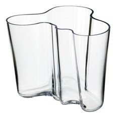 three clear glass vases sitting next to each other