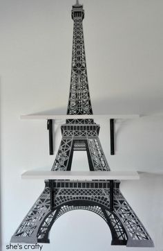 the eiffel tower wall decal is shown in black and white, as well as