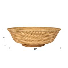 a large woven basket with measurements for the bottom and side section, on a white background