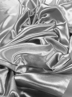 black and white photograph of shiny fabric