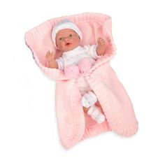 a baby doll laying in a pink blanket