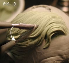 a close up of a person's head with an arrow sticking out of it