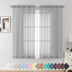 a bedroom with white walls and curtains on the windowsills, along with an assortment of color swatches