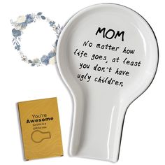 a mother's day gift set with a spoon and card