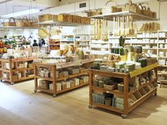 a store filled with lots of shelves and baskets