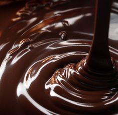 the chocolate swirl is being made with melted chocolate