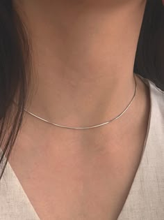 Editor's Notesbyweekend presents an essential snake chain necklace with silky smooth gloss. It is a simple yet, feminine item that stands out. - Snake chain- Silky smooth gloss- Made of silver 925- 18K gold plated- Sleek silhouette- Simple and basic style Measurements(in.)One Size- Size: 14.96 in. ( + 1.97 in. ) Composition & Care- Material: Silver 925, 18K Gold Plating- Plated products may discolor over time due to their nature.- Please be careful that discoloration may proceed faster in chemical substances, water, and heat.- As all jewelry products are vulnerable to discoloration, we recommend you gently wipe them with a dry cloth and store them in an airtight zipper bag when not wearing them Designer- by byweekend Daily Wear Neck Chain, Simple Chain Necklace Silver, Short Chain Necklace, Stackable Necklaces Silver, Classic Silver Snake Chain Necklace For Everyday, Silver Classic Snake Chain Necklace, Silver Snake Chain Necklace With Delicate Chain For Everyday, Classic Herringbone Snake Chain Necklace, Everyday Silver Snake Chain Necklace