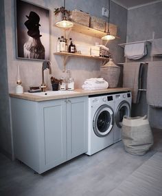 a washer and dryer in a small room