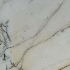 the marble is white and has black lines on it