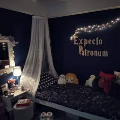 a bedroom decorated in black and white with lights on the wall