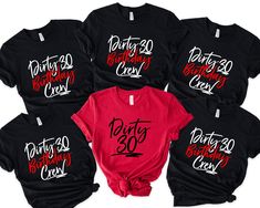 six matching shirts with the number thirty and thirty on them, all in black and red