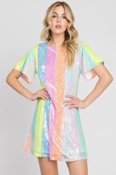 Step into a world of whimsical charm with our Happy Place Rainbow Sequin Mini Dress. This enchanting dress features a mesmerizing pattern of pastel-colored sequins arranged in playful stripes. The vibrant hues and sparkling sequins create a dazzling effect that is sure to make you stand out from the crowd. Whether you're attending a festive event, on a game day,a night out with friends, or simply want to add a touch of magic to your wardrobe. The perfect choice for game day, party nights, summer Bright Color Dress Party, Drag Show Outfit, Womens Rainbow Dress, Flowy Yellow Dress, Lover Era Outfits, Neon Carnival, Eras Concert, Lover Outfit, Era Tour