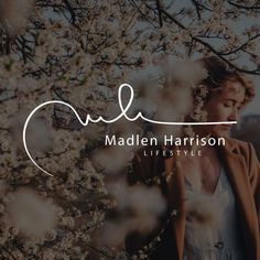 a woman standing in front of a tree with flowers on it and the words madison harrison life style