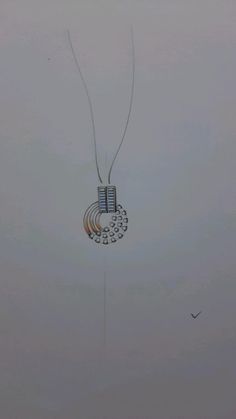 a kite flying in the sky on a foggy day