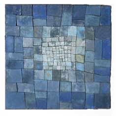 a blue and white painting with squares on it