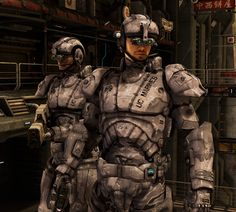 two sci - fi characters standing in front of a large machine room with other equipment