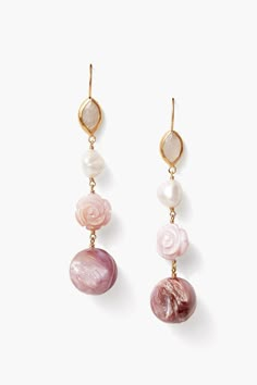 A romantic spirit animates these statement earrings. Tiers of moonstone, keshi pearls, purple mother of pearl roses and rounds sway from 18k gold plated sterling silver French hooks. A statement design perfect on its own or paired with dainty styles. 18k gold plated sterling silver.3" drop.Handmade in Vietnam. Purple Pearl Earrings, Soft Summer Jewelry, Magpie Collection, Ideal Aesthetic, Dainty Style, Romantic Earrings, Unique Handmade Earrings, 30s Fashion, White Freshwater Pearl