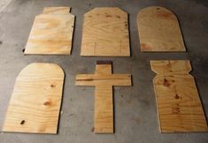 wooden crosses laid out next to each other