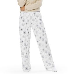 Get the comfort of pajamas in this stylish pair of wide-leg pants. With the adjustable waist and stretchy fabric, it's like your favorite sweatpants but better. * Relaxed unisex fit * Practical side pockets * Elastic waistband with a white drawstring * Can be worn on the waist or on the hips * Premium knit mid-weight jersey fabric * 95% polyester, 5% elastane (fabric composition may vary by 1%) * Fabric weight: 6.19 oz/yd2 (210 g/m2) (weight may vary by 5%) Comfortable Pants For Spring Pajama Party, Comfortable Pants For Pajama Party In Spring, Relaxed Fit Pants With Elastic Waistband For Bedtime, Wide Leg Pants With Elastic Waistband For Bedtime, Spring Season Elastic Waistband Bedtime Pants, Spring Bedtime Pants With Elastic Waistband, Spring Wide Leg Pants For Relaxation, Spring Wide Leg Lounging Sleepwear, Floral Print Sleep Bottoms For Spring