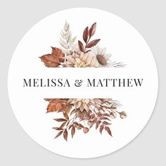 a wedding sticker with flowers and leaves on it