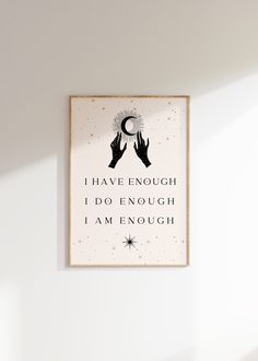 a sign hanging on the wall that says i have enough i do enough i am enough