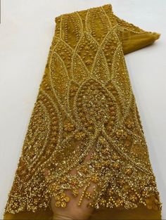 This high quality Fabric is measured in 5 Yards With Embroidered Beading and Sequin. It is soft, very delicate and beautiful. This high Quality Fabric is made with Fashion embroidered rhinestones can be used in making party wedding dresses, skirts, shawls, scarves and other other fashion apparels as you would like. Siz Gold Lace Fabric, Lace Bridal Dress, Bead Lace, Pearl Lace, Wedding Embroidery, Beaded Lace Fabric, Bridal Dresses Lace, Beaded Tulle, Garment Fabric