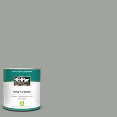 the behr paint and prime in one is light green, with a white base