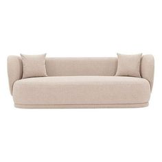 a beige couch with two pillows on the back and one pillow on the side, in front of a white background