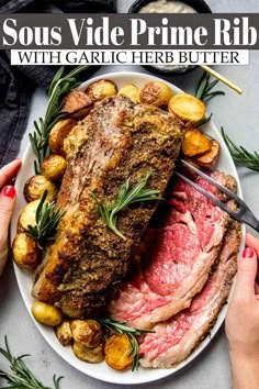 a plate with roast, potatoes and rosemary garnish on it that says sous vie prime rib with garlic herb butter