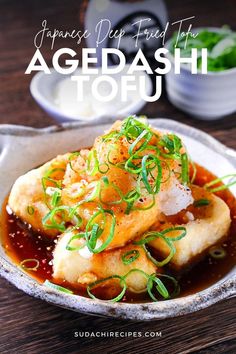 Agedashi tofu (Japanese deep fried tofu) served in a thick soy based sauce and topped with chopped spring onions, grated daikon and Japanese chili pepper (shichimi togarashi). Tofu Recipes Appetizers, Homemade Tofu Recipes, Delicious Tofu Recipes, Tofu Recipes Japanese, Agadashi Tofu Recipes, Tofu Side Dish, Steam Tofu Recipe, Japanese Tofu Dishes, Fried Tofu Recipes