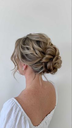 Low Messy Bun Wedding Hair Loose Curls, Messy Curly Bun Wedding, Debs Hair Updo, Low Messy Bun Prom Hair, Deb Hairstyles Bun, Low Messy Wedding Bun, Low Updo Prom Hair, Prom Updos Bun, Low Messy Bun Bridesmaid