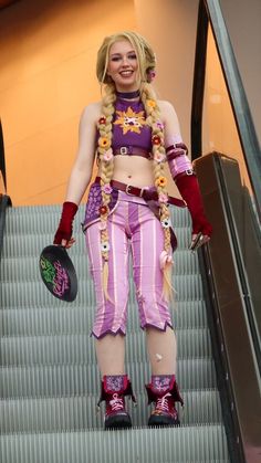 a woman in costume standing on an escalator