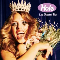 a woman wearing a tiara with flowers in front of her face and the words hole live through this