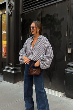 Model wearing our women's shirt which is a white and blue  classic check pattern. She is smiling and standing in front of a coffee shop. Warm Fall Day Outfit, Look Boho Chic, Looks Street Style, Plaid Blouse, Mode Inspo, Outfit Inspo Fall, Business Casual Outfits, Looks Style, Fall Winter Outfits