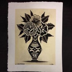 a black and white drawing of a vase with flowers in it on a piece of paper