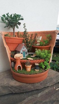 a potted planter filled with lots of plants