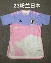 a soccer jersey with the number 23 on it and an image of a pink tie dye shirt