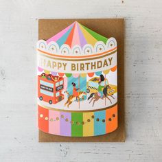 a birthday card with an image of a carnival ride