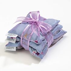 Our trio of silk-covered approximately 4.5", 4" and 3.5" square lavender sachets will freshen drawers and repel insects for years to come with an occasional squeeze. ST0006 Embroidered Lavender, Lavender Fabric, Lavender Spa, Spa Items, Spa Gift Basket, Purple Bouquet, Scented Sachets, Lavender Candle, Lavender Buds