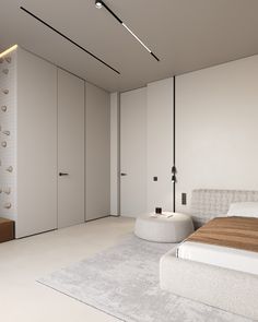 a modern bedroom with white walls and flooring