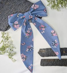 Add a touch of whimsy to your look with our playful Butterfly and Floral Hair Bow. This delightful accessory features a soft blue background with delicate butterflies and vibrant flowers, perfect for adding a touch of personality to any outfit. Made with high-quality upcycled fabric and designed for comfort and durability, this bow will keep your hair in place all day long. With a 8cm French Barrette Clip. Perfect for:  Adding a touch of personality to any outfit Creating stylish updos or ponyta Long Tail Butterfly, Stylish Updos, Butterfly And Flower, Upcycled Fabric, Bow Hair Accessories, Vibrant Flowers, Flower Blue, French Barrette, Clip Hair