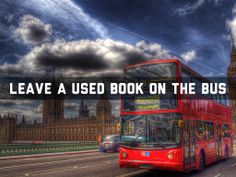 a red double decker bus driving down the street in front of big ben and parliament