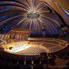 an empty concert hall filled with lots of seats